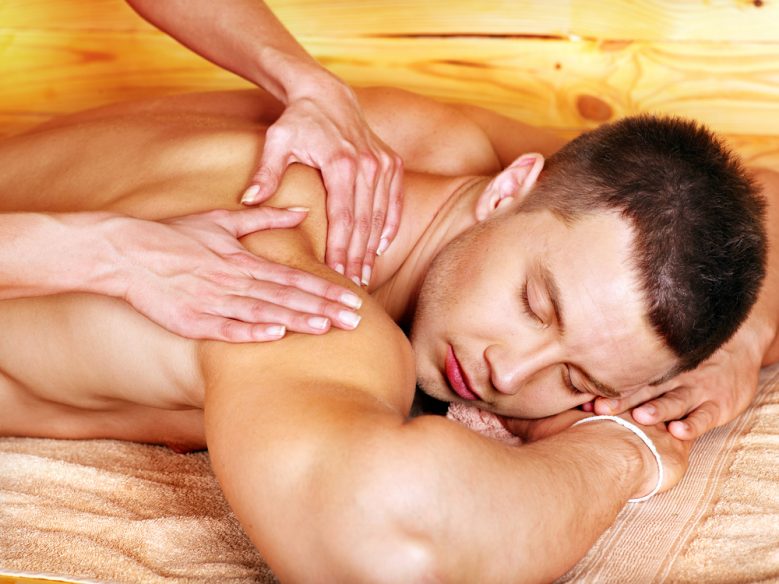 Men massaging men
